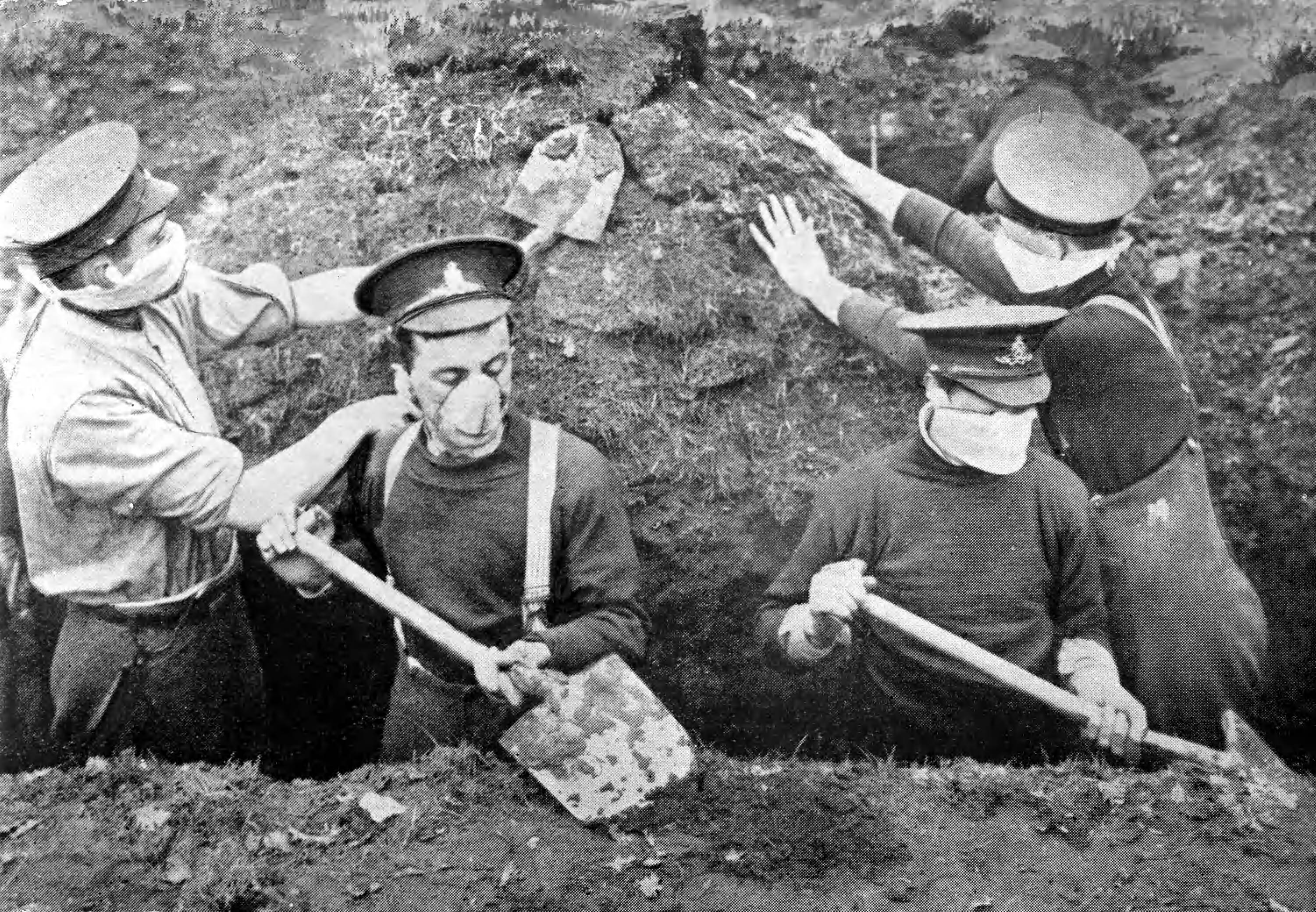 Britse soldaten in loopgraaf met gasmaskers, http://hdl.handle.net/10648/35429da5-c3ed-a382-e063-6df0900a6686.